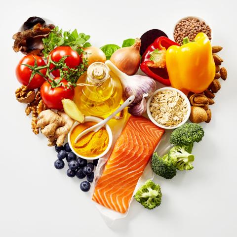 Image of healthy foods arranged in a heart shape.