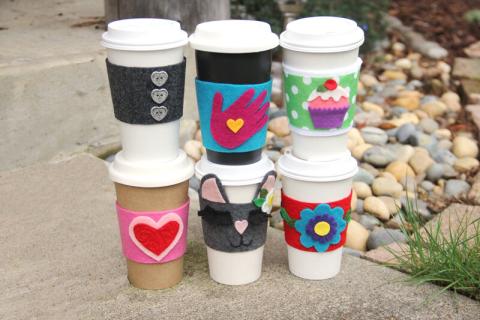 six mugs with handmade cozies