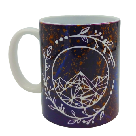 Mug with mountain and leaf design