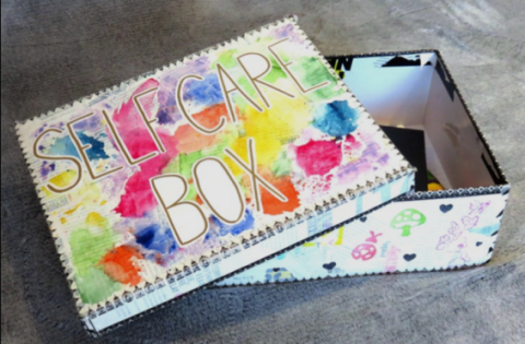 Box with the text Self Care written on it