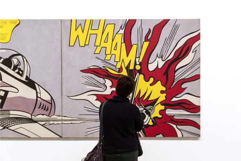 A person views a Lichtenstein artwork in London, UK
