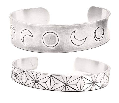 Engraved metal bracelets with moon design and geometric design