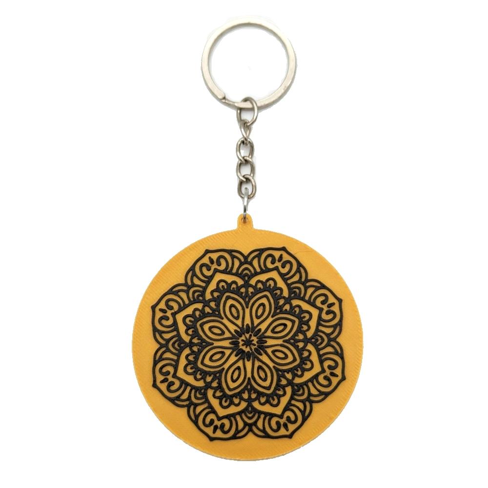 3D printed round keychain with mandala design